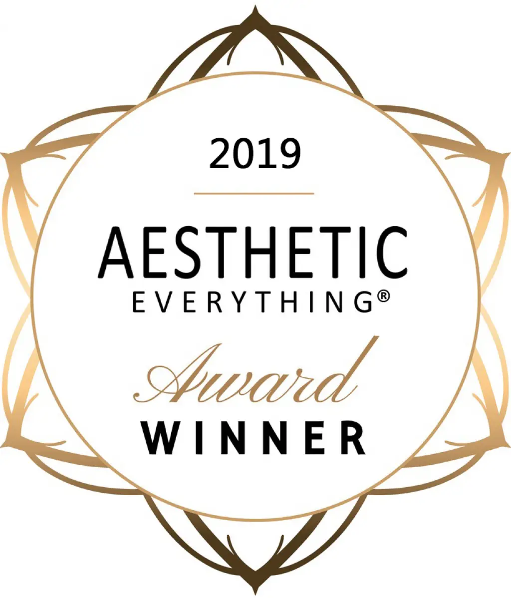 2019 Aesthetic Everything Award Winner logo featuring a circular design with gold accents, highlighting the recognition in the aesthetics industry.