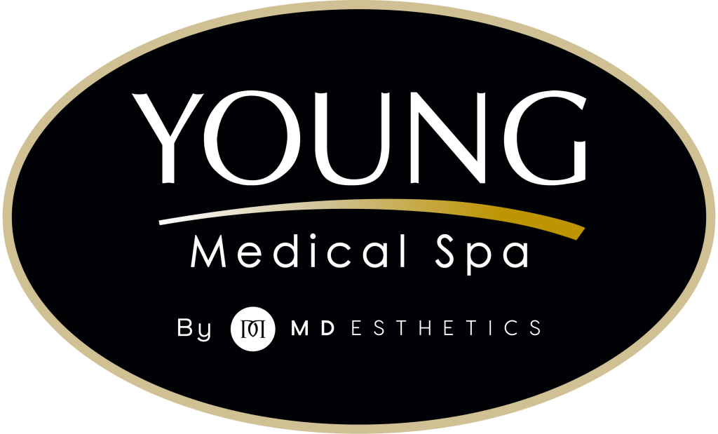 Logo of Young Medical Spa, featuring the name "YOUNG" in bold white letters on a black background, with "Medical Spa" in smaller white text below. The design includes a gold curved line beneath the name and the phrase "By MD Esthetics" in smaller font at the bottom. This image represents a modern aesthetic clinic focused on beauty and wellness services.